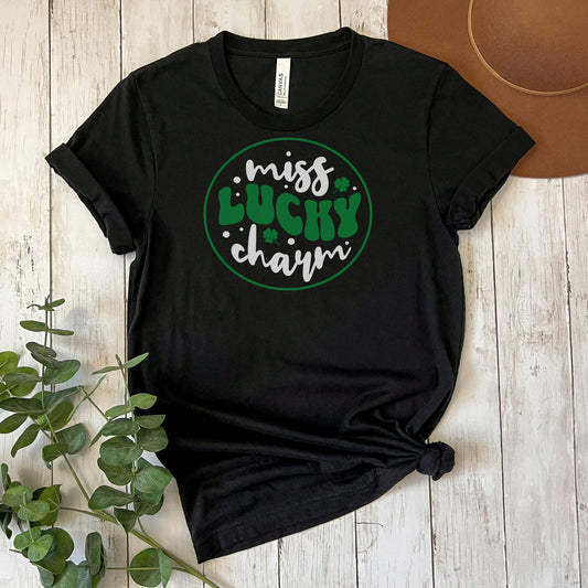 Black t-shirt with Miss Lucky Charm graphic