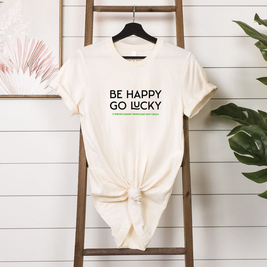 T-shirt - Be happy go lucky - hanging in natural