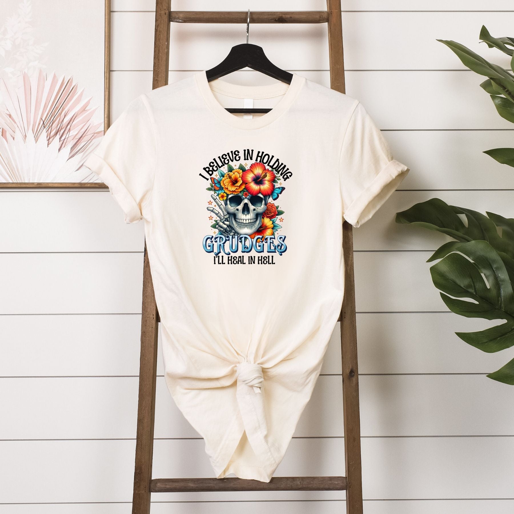 I Believe in Holding Grudges T-shirt Hanging in Soft Cream 