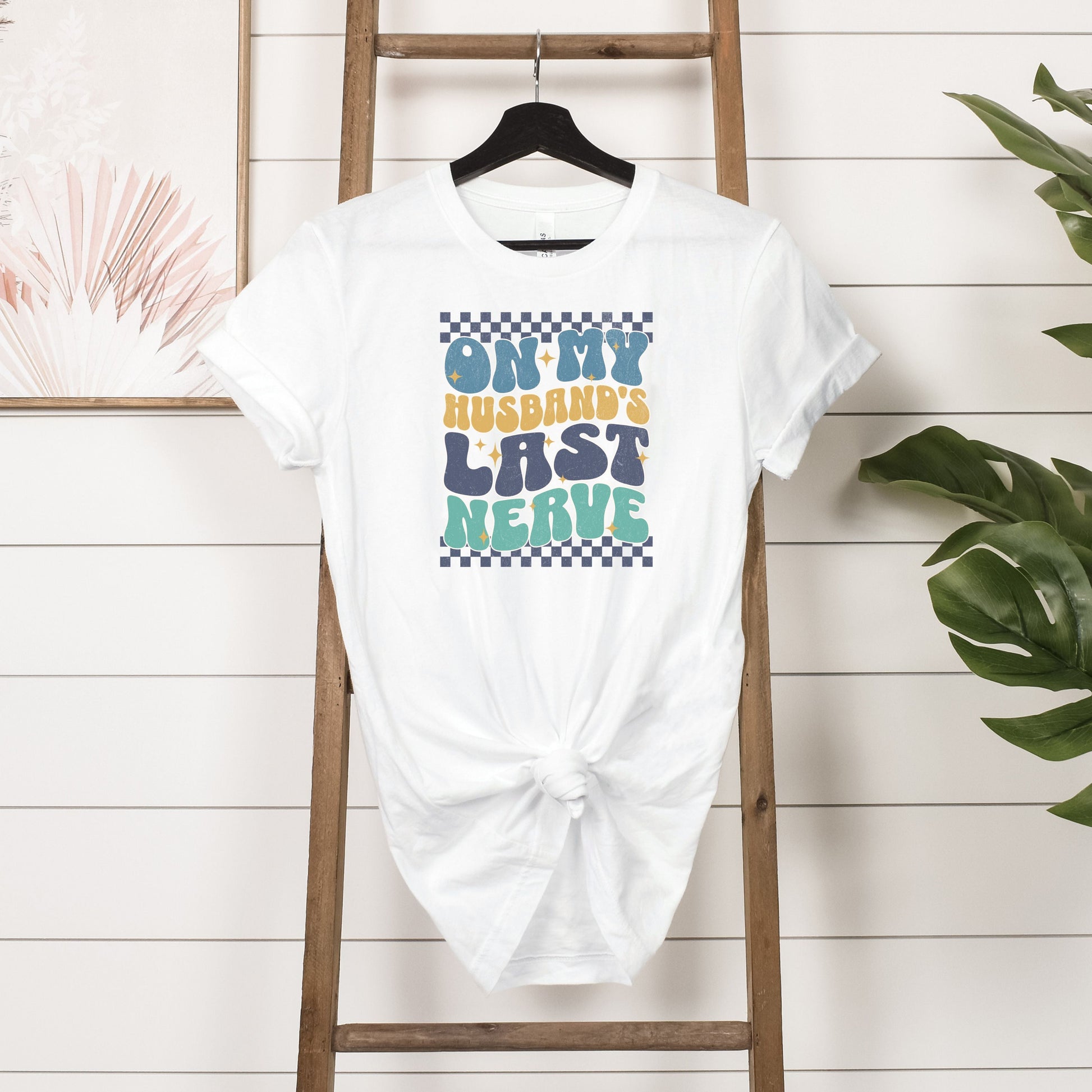On My Husband's Last Nerve T-Shirt Hanging In White 