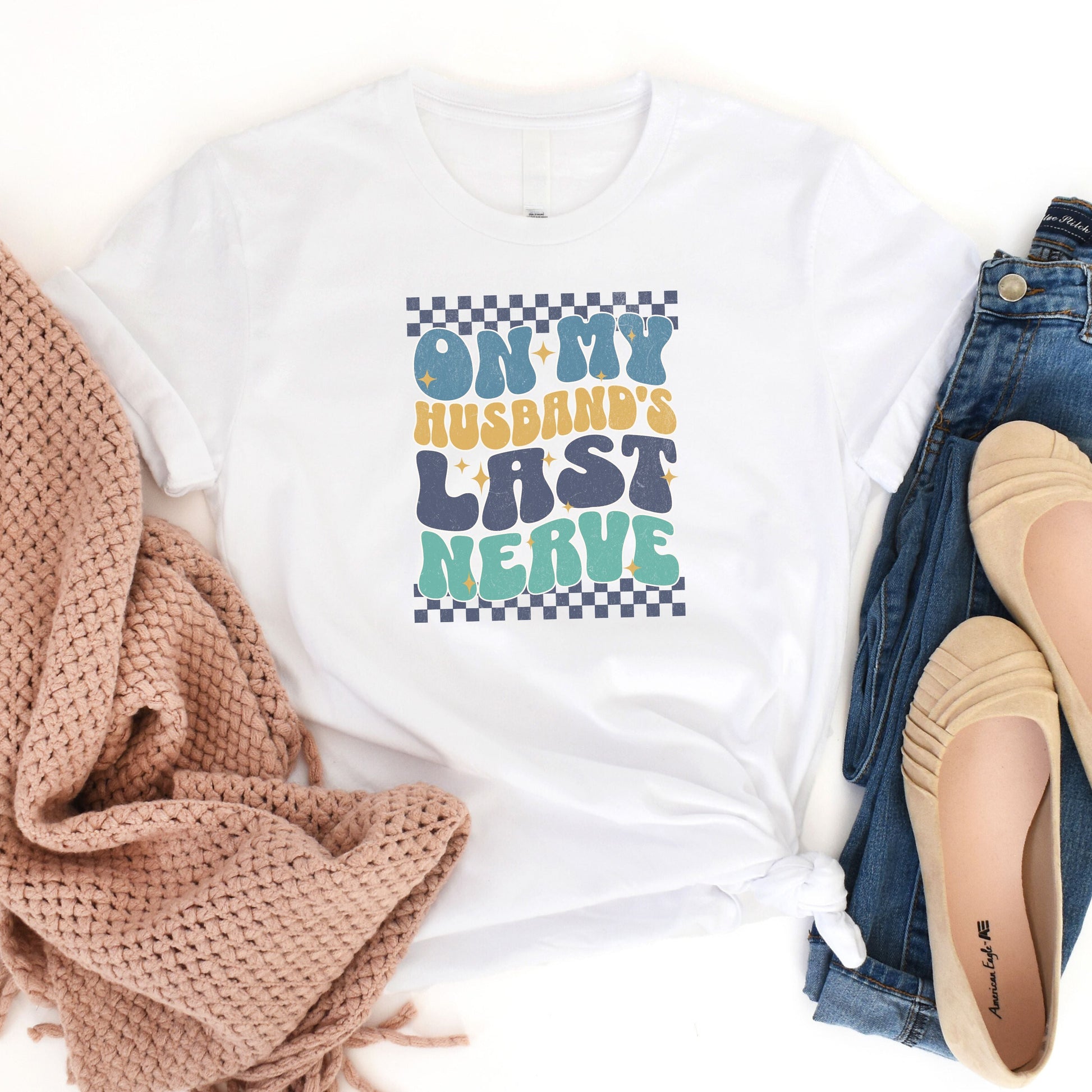 On My Husband's Last Nerve T-Shirt Flat Lay in White 
