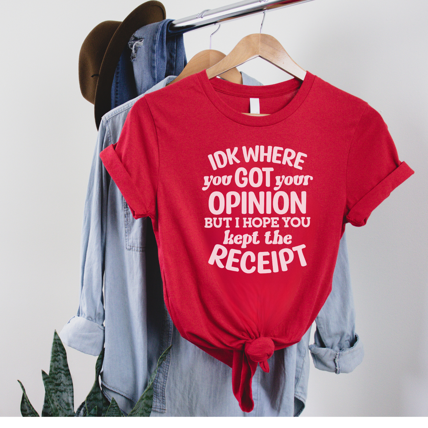 IDK Where You Got Your Opinion Tee Hanging in Red 