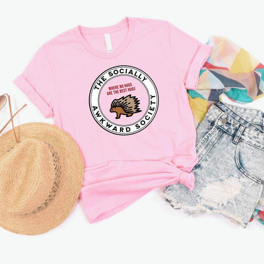 The socially awkward society t-shirt flat lay in pink 